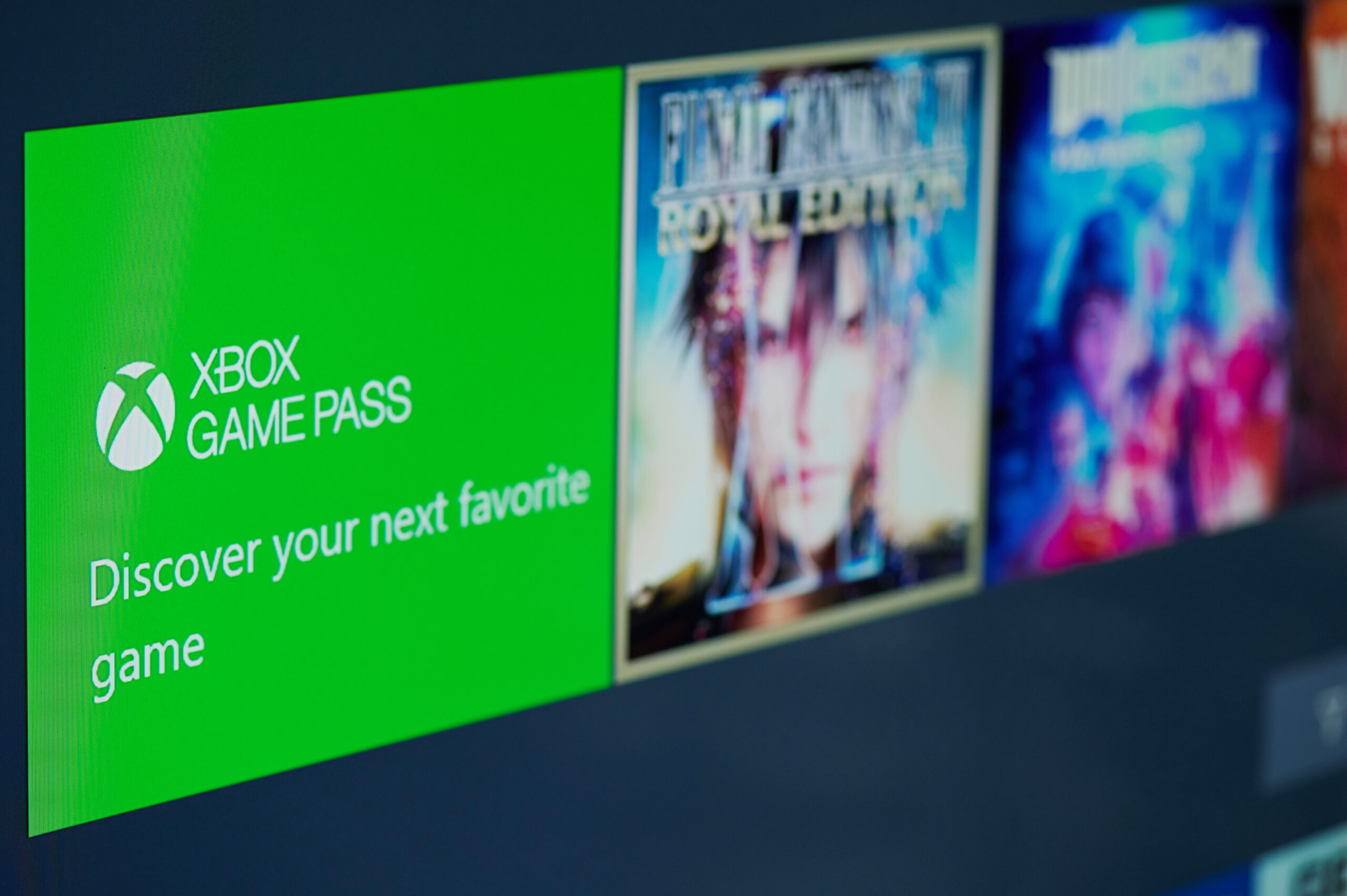 New-York , USA - February 11, 2020: Xbox game pass subscription for gaming online on tv screen close up